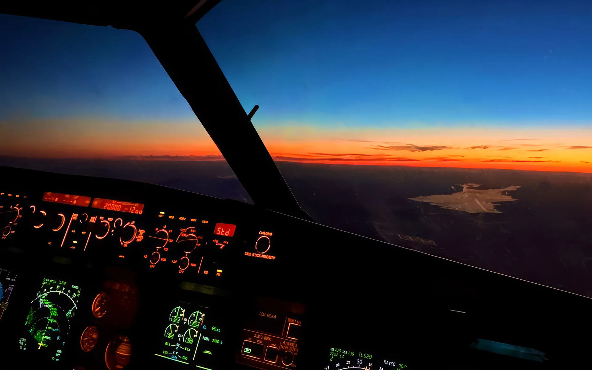 Blick aus dem Cockpit eines Flugzeugs bei Dämmerung